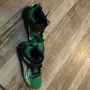 Kids Nike green and black cleats shoe size 3Y